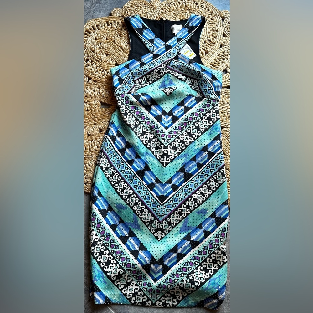 Multi colored cocktail dress. Size 10. Zipper closure. New with tags.